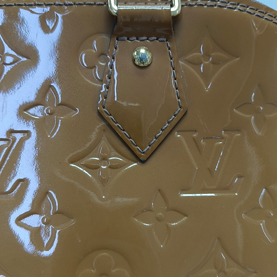 Authenticated pre-owned  Alma PM Patent Leather Beige - Top Handle Bag at Looply