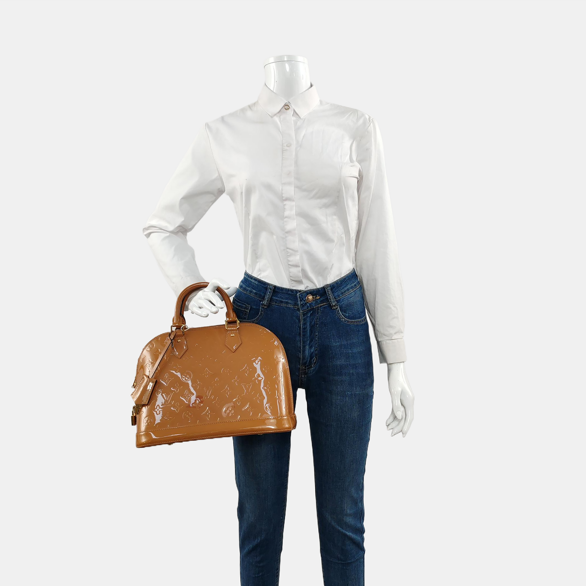 Authenticated pre-owned  Alma PM Patent Leather Beige - Top Handle Bag at Looply
