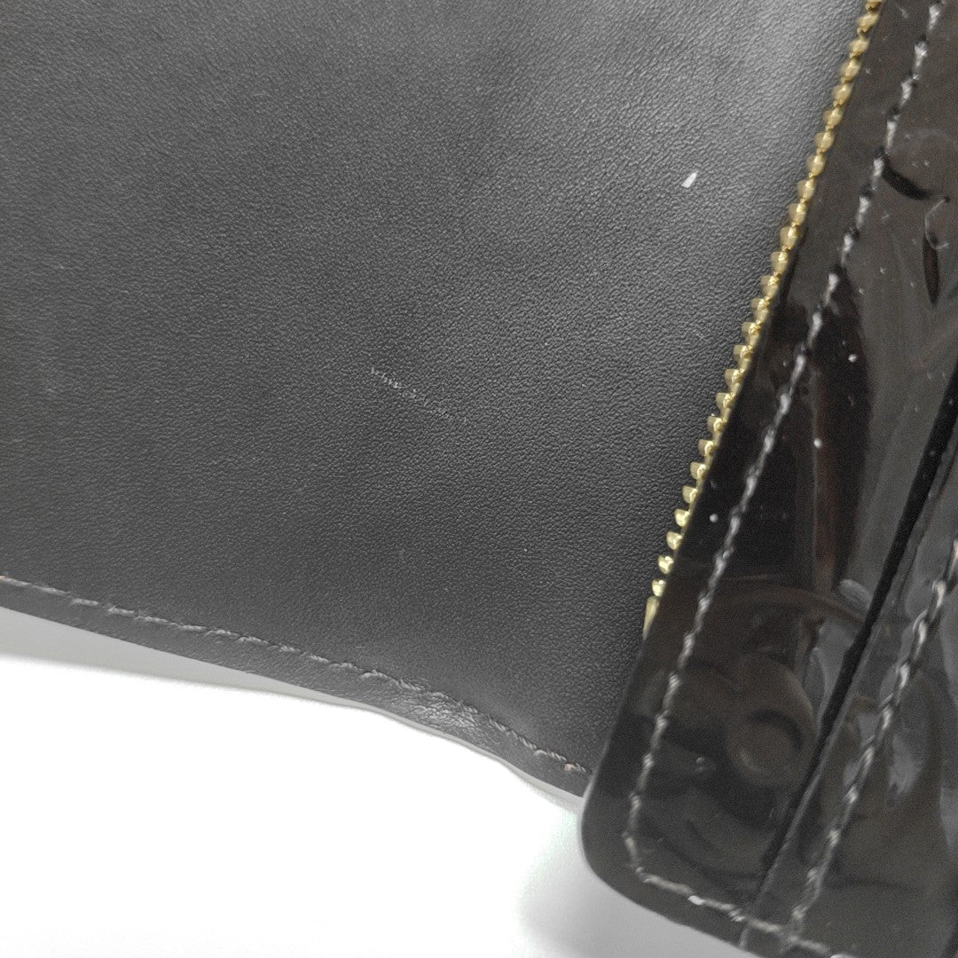 Authenticated pre-owned  LV × TM Sarah Patent Leather Burgundy - Clutch at Looply