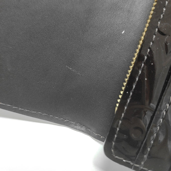 Authenticated pre-owned  LV × TM Sarah Patent Leather Burgundy - Clutch at Looply