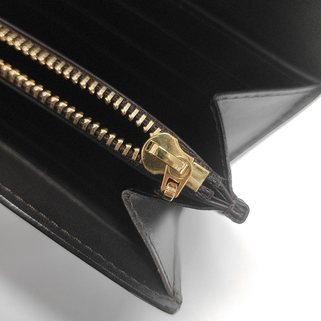 Authenticated pre-owned  LV × TM Sarah Patent Leather Burgundy - Clutch at Looply
