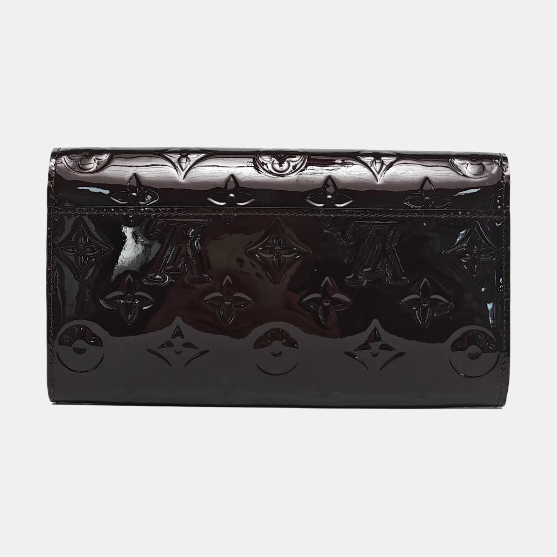 Authenticated pre-owned  LV × TM Sarah Patent Leather Burgundy - Clutch at Looply