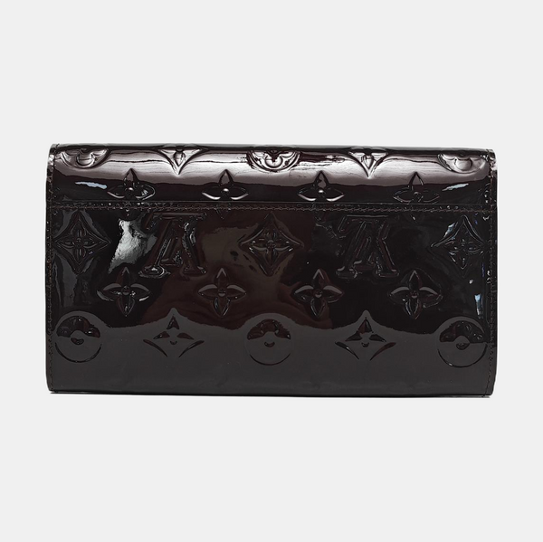 Authenticated pre-owned  LV × TM Sarah Patent Leather Burgundy - Clutch at Looply
