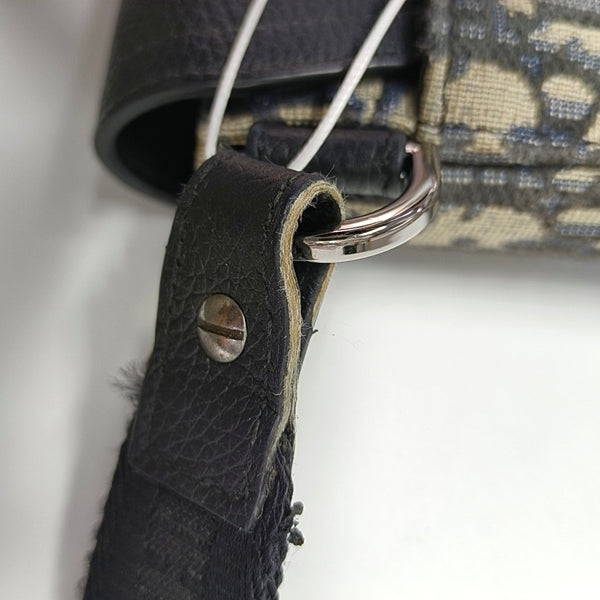 Authenticated pre-owned  Saddle Oblique Canvas Beige - Clutch at Looply
