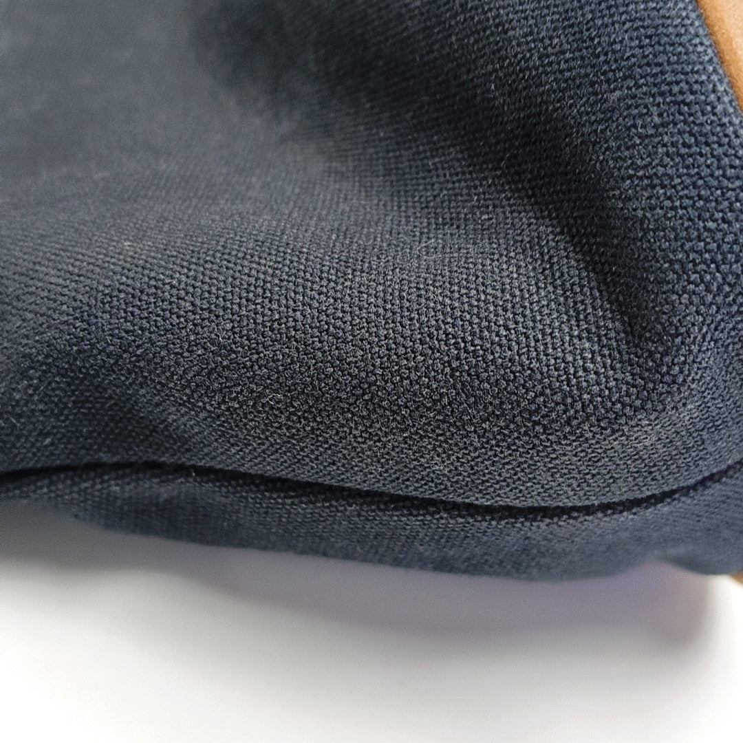 Authenticated pre-owned  Bolide Canvas Black - Clutch at Looply