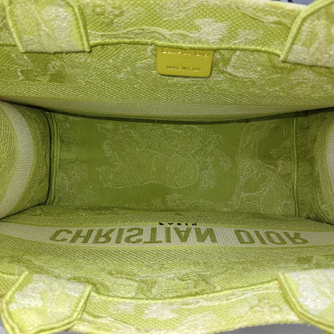 Authenticated pre-owned  Book Tote Medium Fabric Yellow - Top Handle Bag at Looply