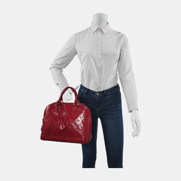 Authenticated pre-owned  Alma PM Monogram Calfskin Red - Top Handle Bag at Looply