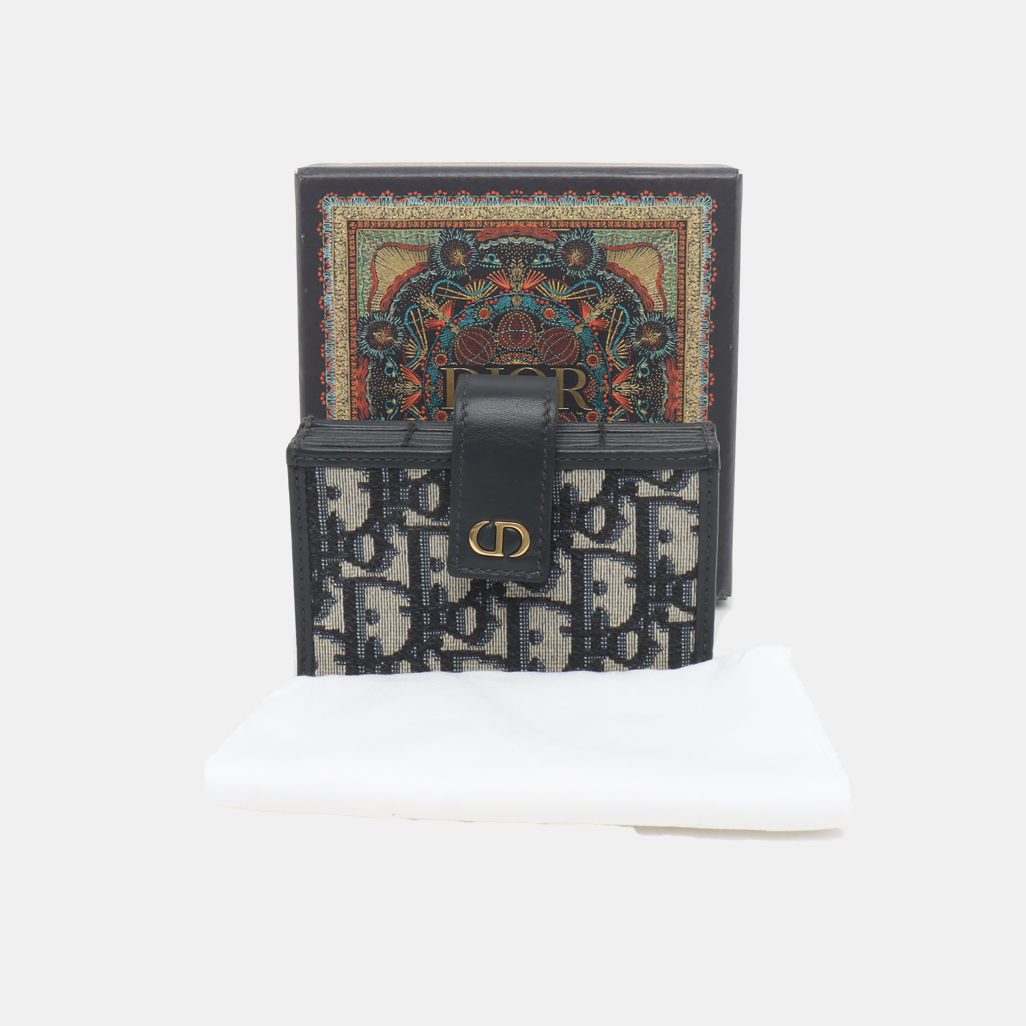 Authenticated pre-owned  30 Montaigne Canvas Blue Card Holder - Card Holder at Looply