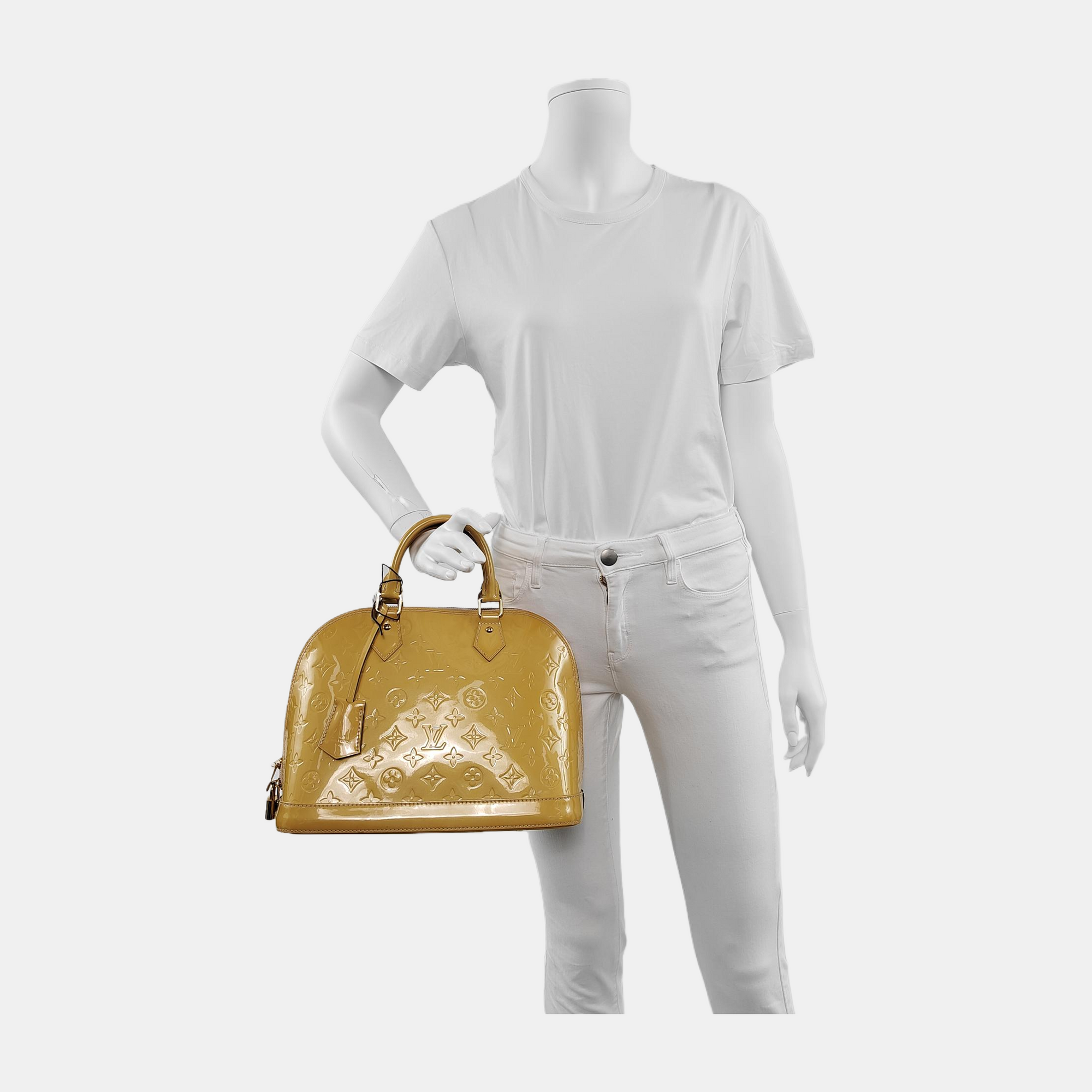 Authenticated pre-owned  Alma PM Patent Leather Yellow - Top Handle Bag at Looply