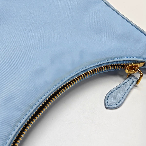 Authenticated pre-owned  Re-edition2005 Mini Nylon Blue - Top Handle Bag at Looply