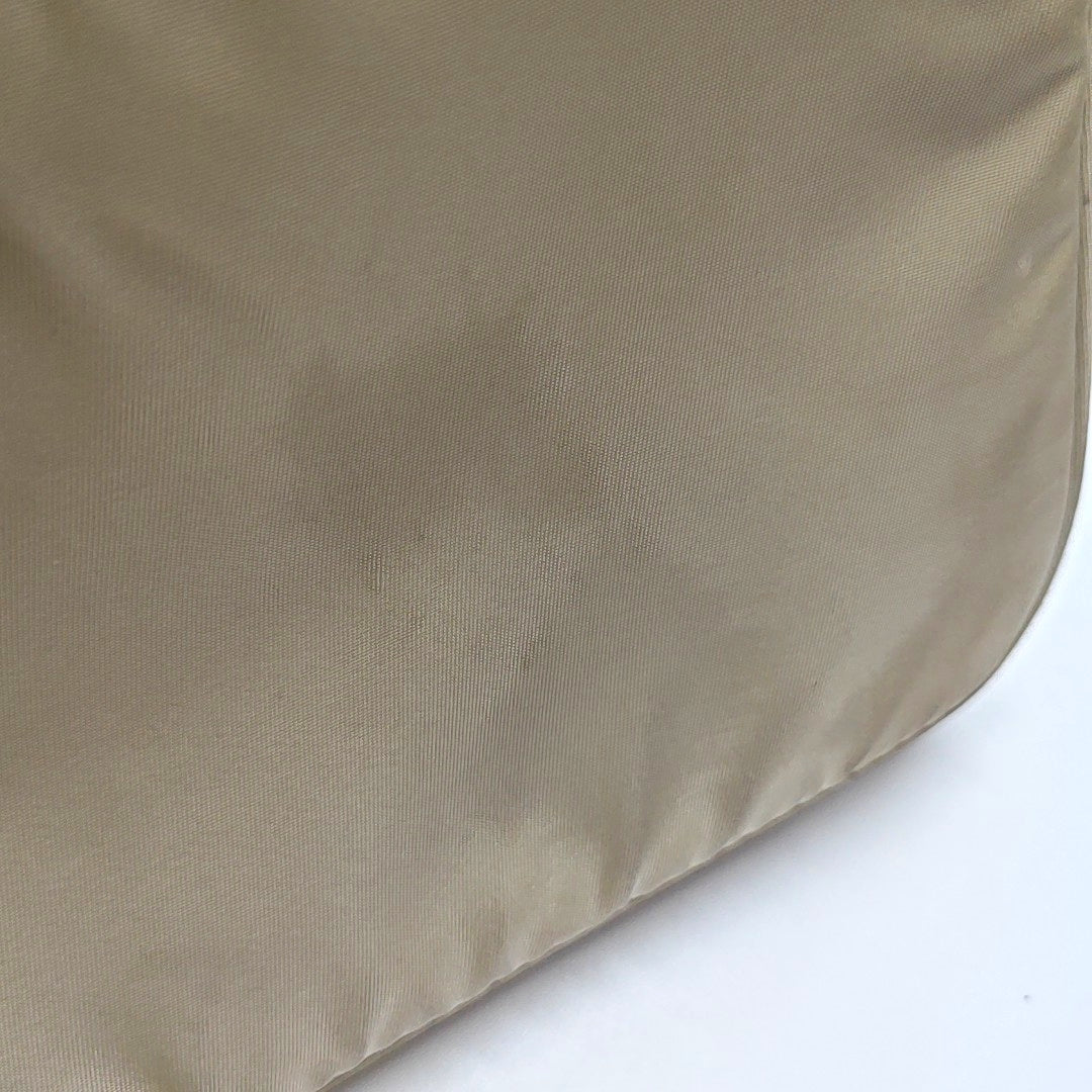 Authenticated pre-owned  Reedition2000 Mini Nylon Beige - Top Handle Bag at Looply
