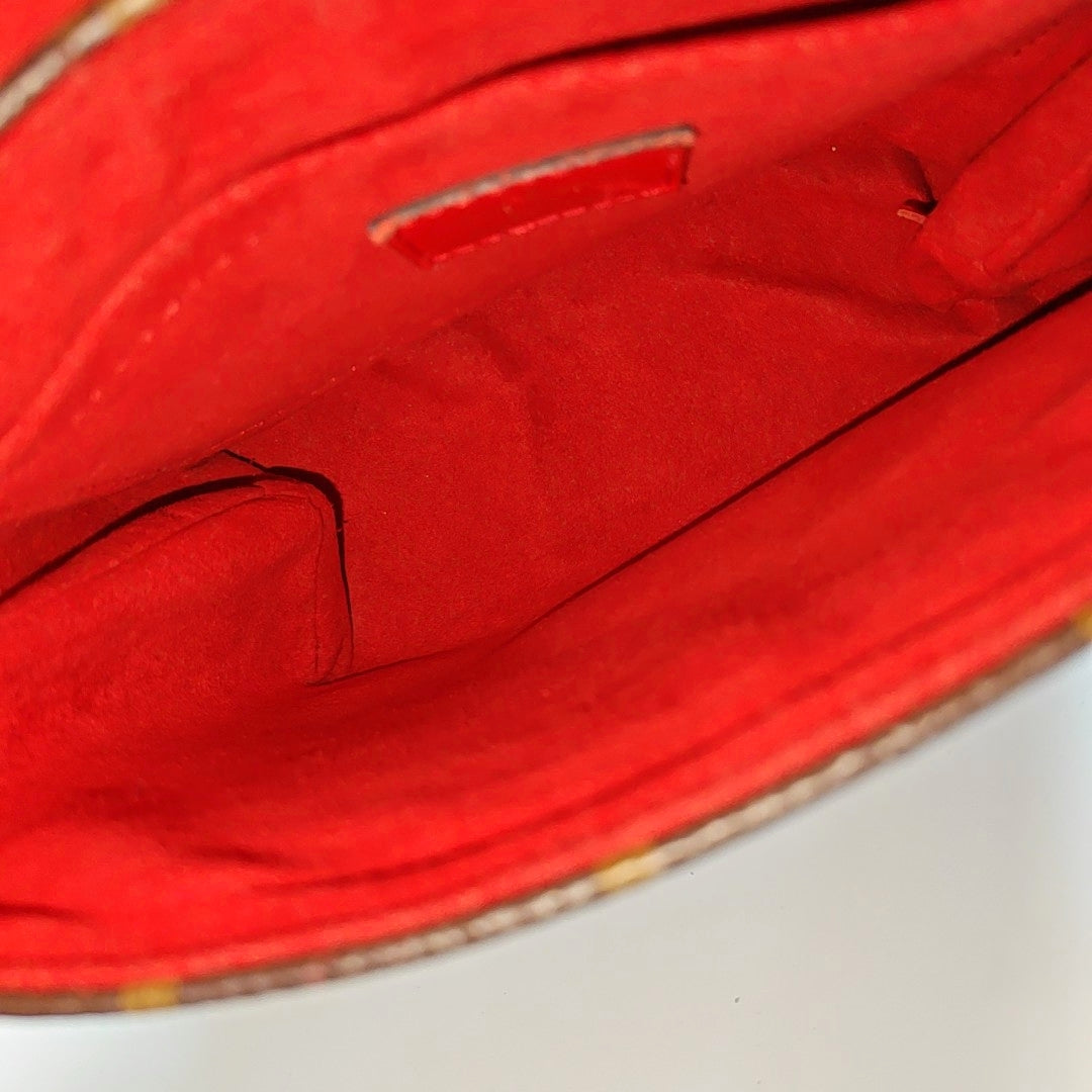 Authenticated pre-owned  Locky BB Monogram Coated Canvas Red - Shoulder Bag at Looply