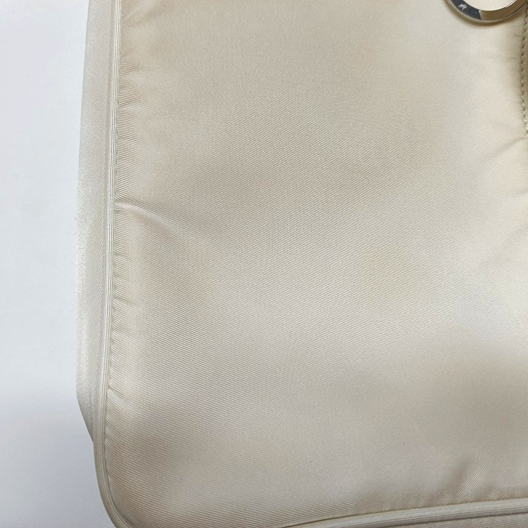 Authenticated pre-owned  Re-Edition2000 Mini Nylon White - Top Handle Bag at Looply