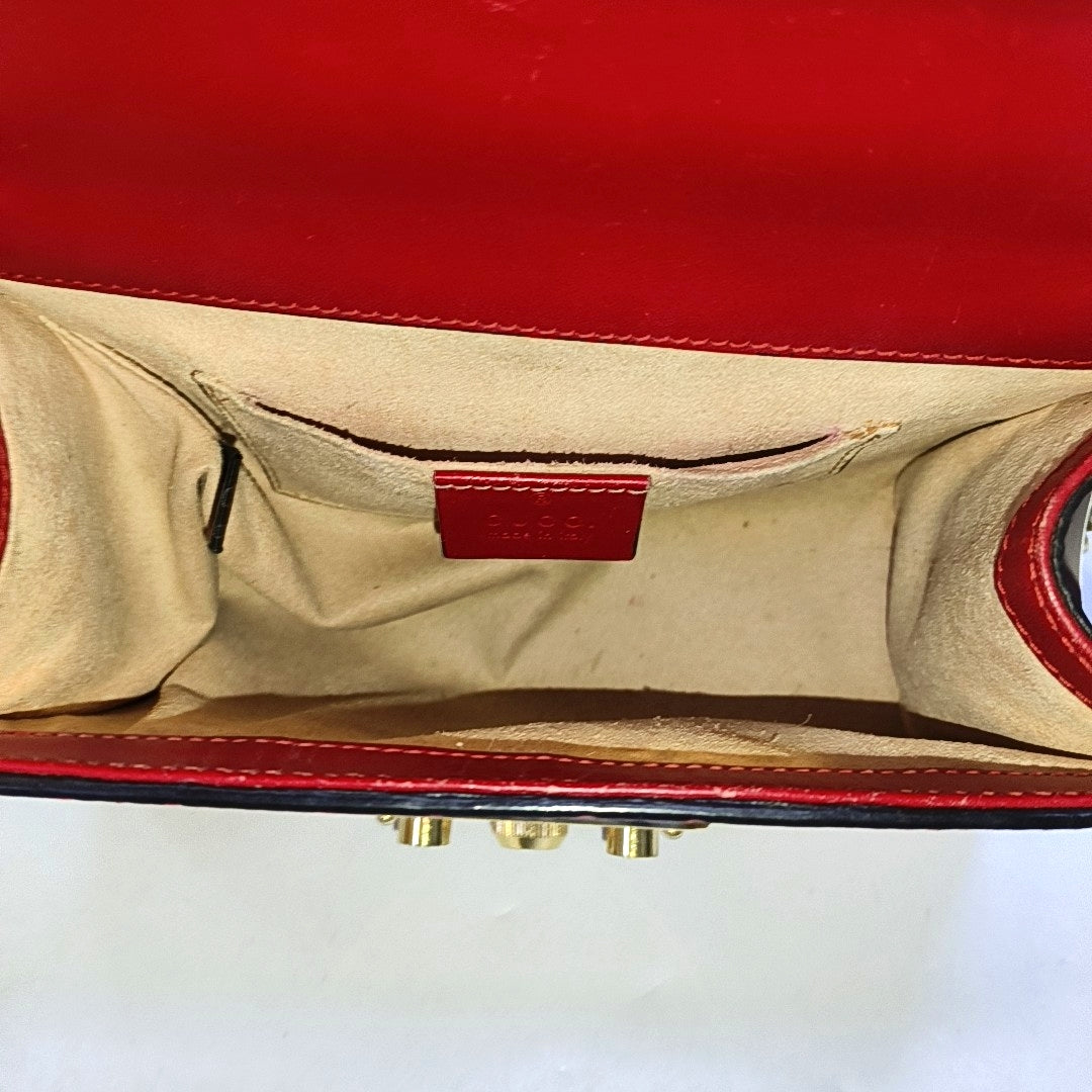 Authenticated pre-owned  Padlock Small Monogram Calfskin Red - Crossbody Bag at Looply
