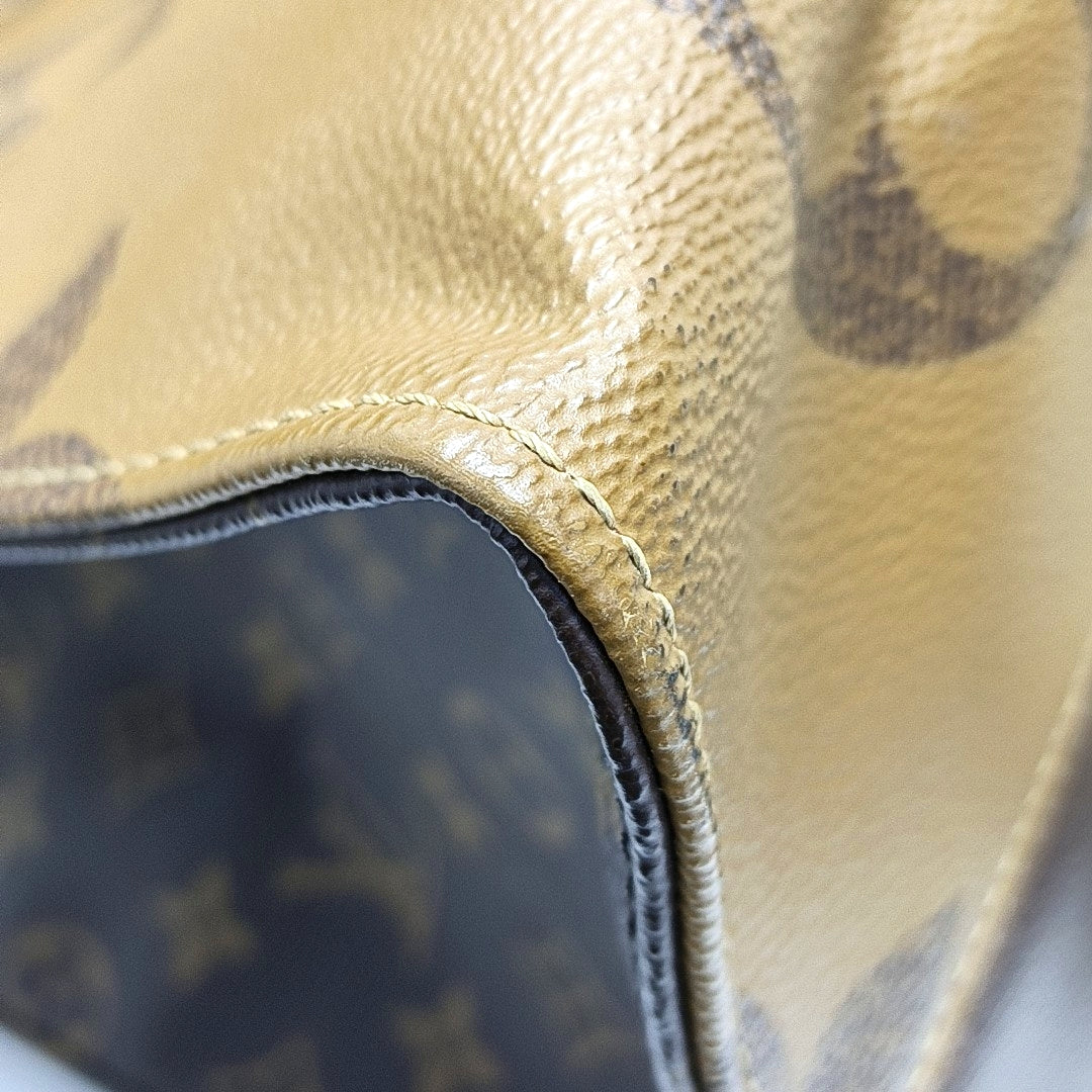 Authenticated pre-owned  Onthego GM Monogram Coated Canvas Brown - Shoulder Bag at Looply
