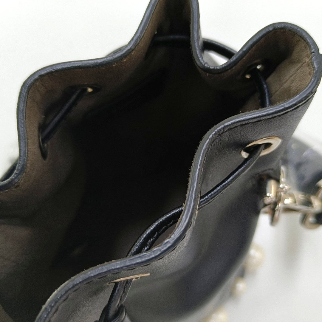 Authenticated pre-owned  Mon Tresor Small Calfskin Black - Top Handle Bag at Looply
