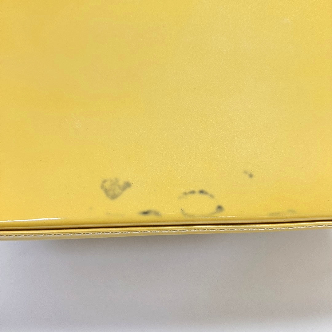 Authenticated pre-owned  Alma PM Monogram Patent Leather Yellow - Top Handle Bag at Looply