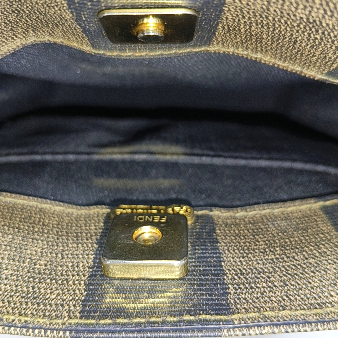 Bolso de hombro de lona revestida marrón