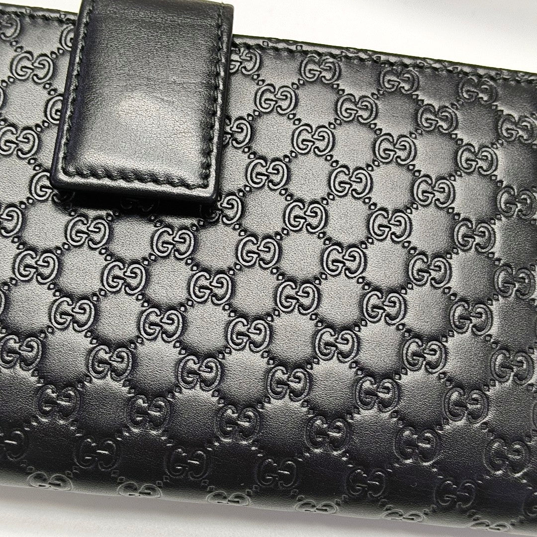 Authenticated pre-owned  Microguccissima Monogram Calfskin Black Wallet - Wallet at Looply