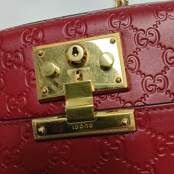 Authenticated pre-owned  Padlock Small Monogram Calfskin Red - Shoulder Bag at Looply