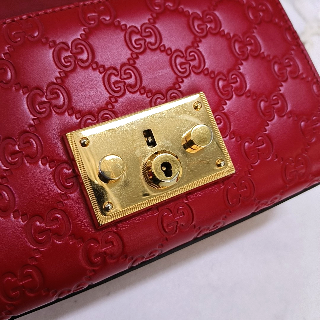 Authenticated pre-owned  Padlock Small Monogram Calfskin Red - Shoulder Bag at Looply