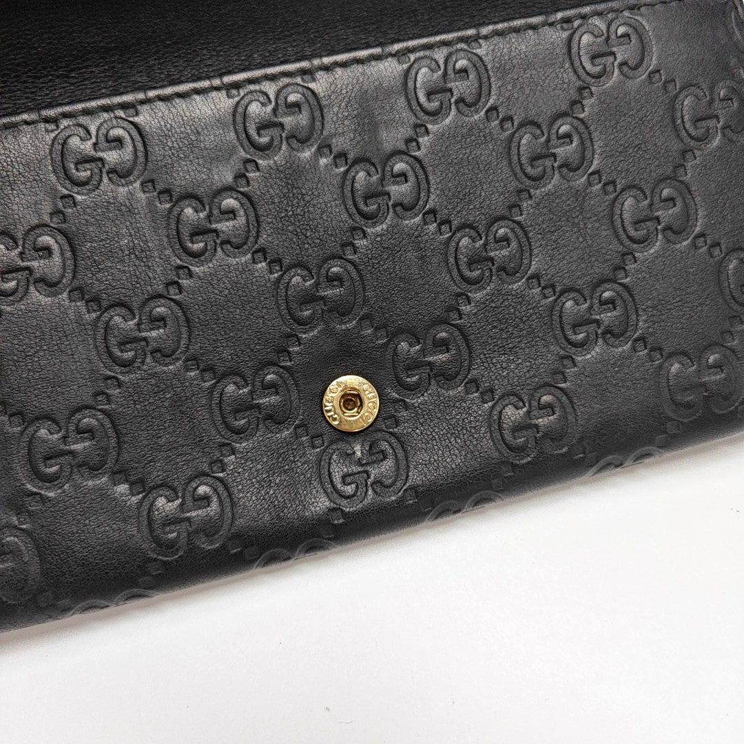 Authenticated pre-owned  Microguccissima Monogram Calfskin Black Wallet - Wallet at Looply