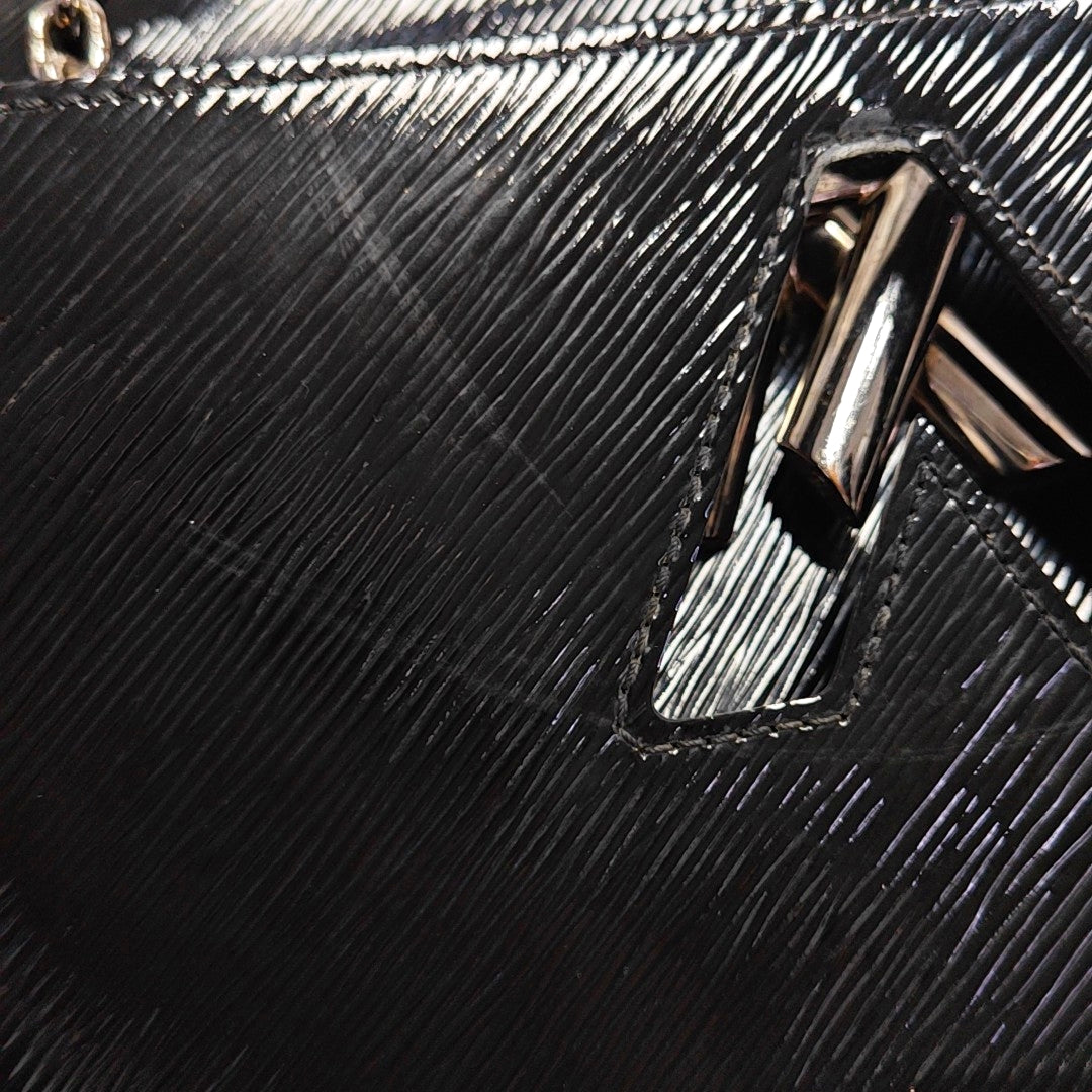 Authenticated pre-owned  Twist MM Epi Black - Shoulder Bag at Looply
