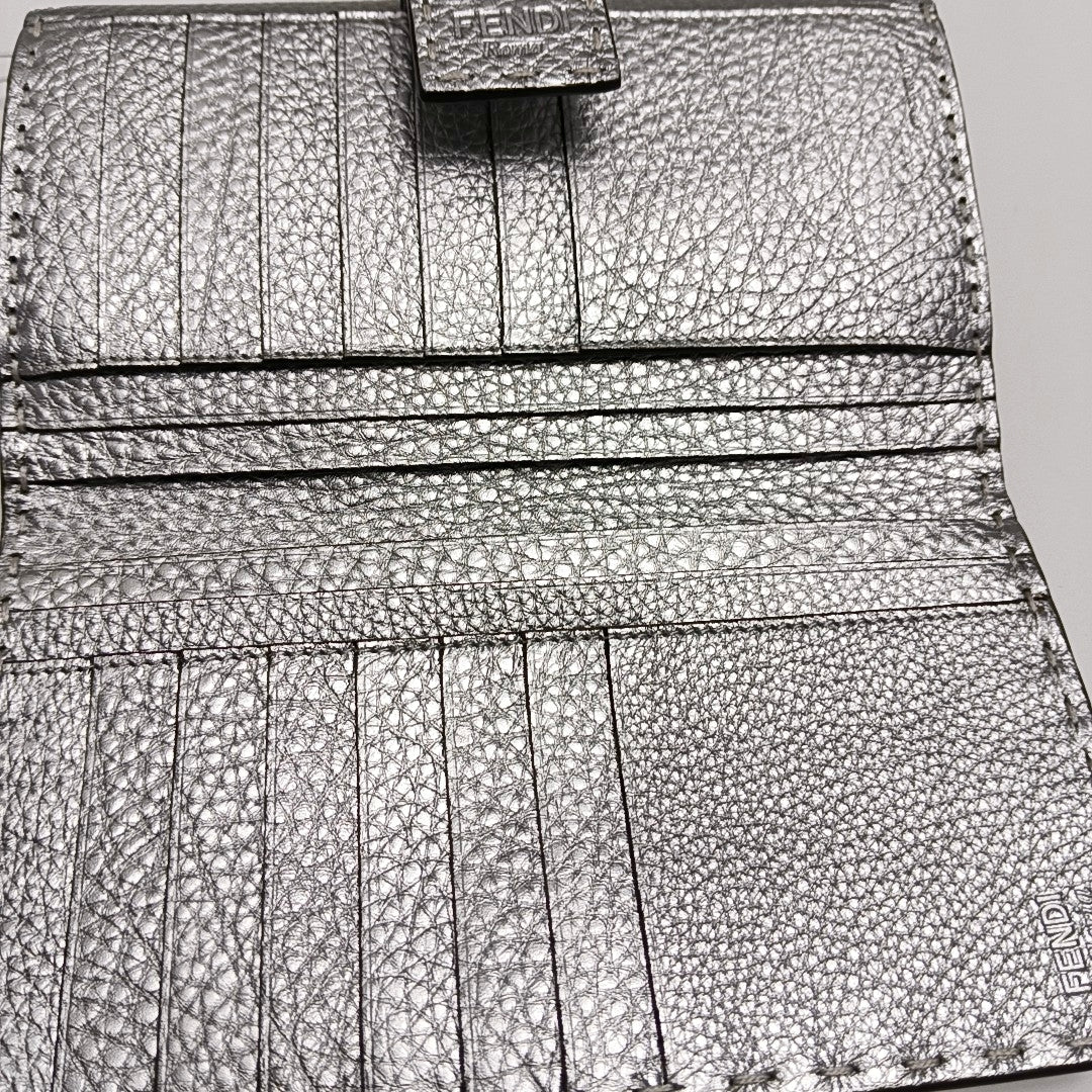 Authenticated pre-owned  Peekaboo Calfskin Silver Wallet - Wallet at Looply