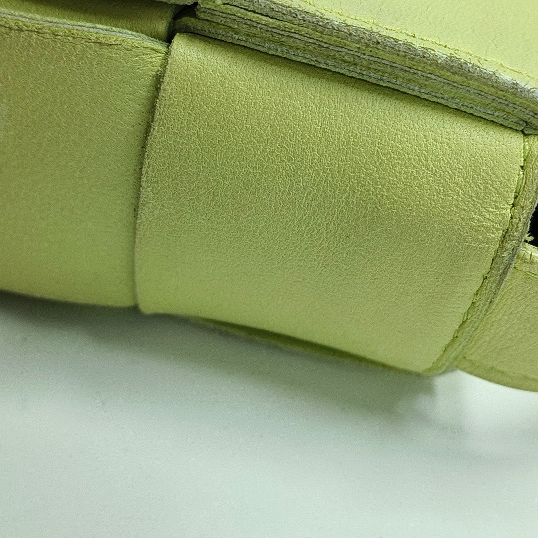 Authenticated pre-owned  Cassette Small Lambskin Yellow - Crossbody Bag at Looply