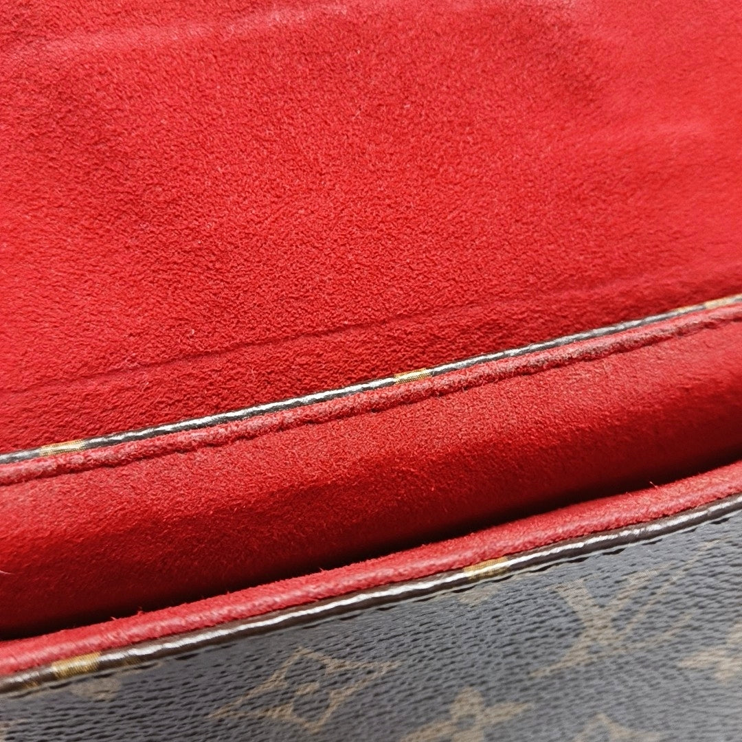 Authenticated pre-owned  Locky BB Monogram Coated Canvas Red - Shoulder Bag at Looply
