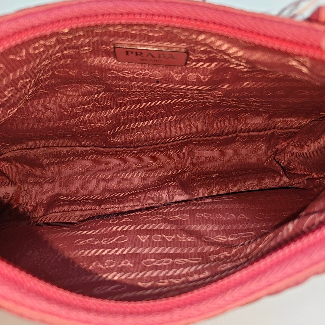 Authenticated pre-owned  Re-edition2000 Mini Nylon Pink - Top Handle Bag at Looply