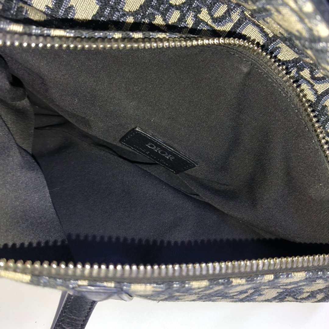 Authenticated pre-owned  Saddle Medium Oblique Canvas Blue - Crossbody Bag at Looply