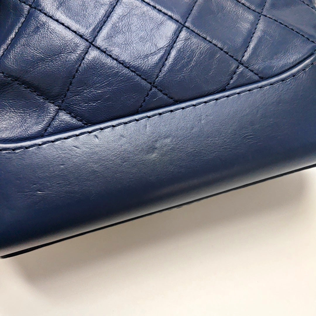 Authenticated pre-owned  Gabrielle Small Quilted Calfskin Blue - Clutch at Looply