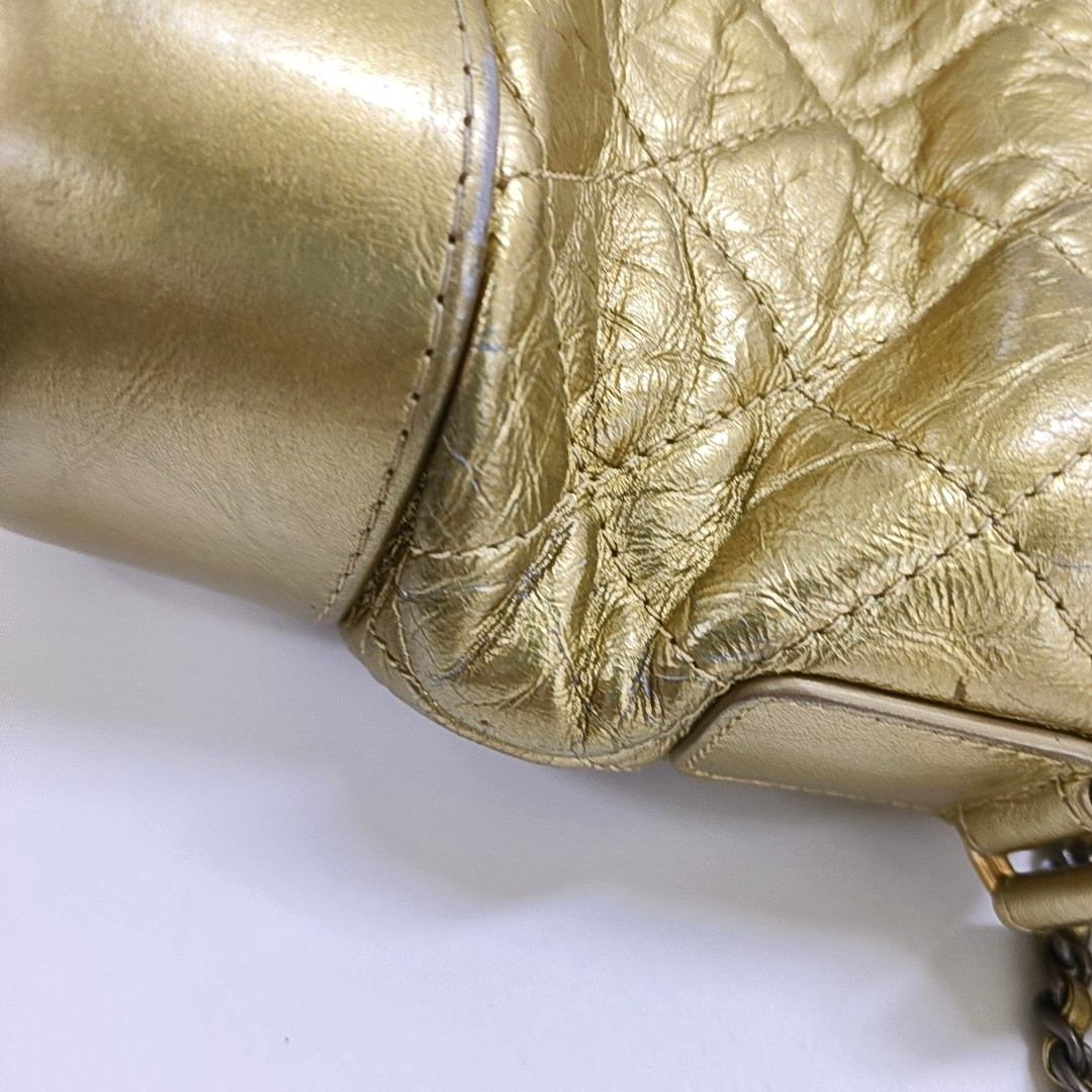 Authenticated pre-owned  Gabrielle Small Quilted Calfskin Gold - Crossbody Bag at Looply