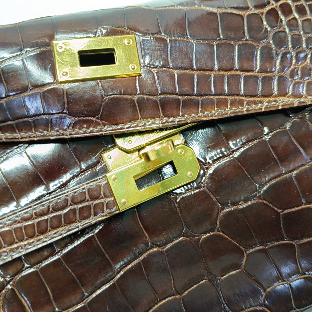 Authenticated pre-owned  Kelly Shiny Porosus Crocodile Brown Wallet - Wallet at Looply