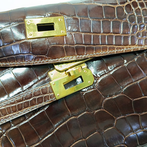 Authenticated pre-owned  Kelly Shiny Porosus Crocodile Brown Wallet - Wallet at Looply