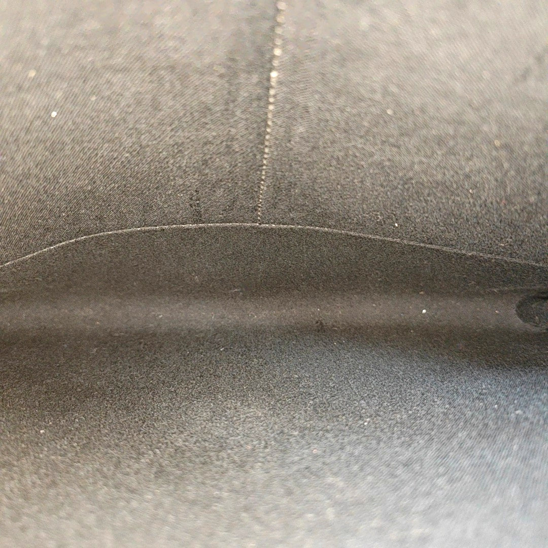 Authenticated pre-owned  Karlito Calfskin Black - Clutch at Looply