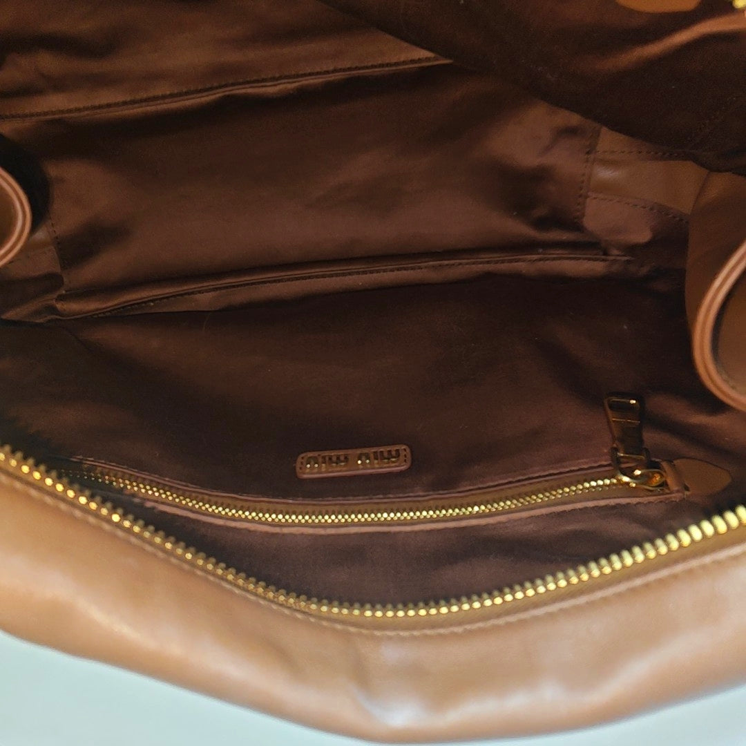 Authenticated pre-owned  Beau Large Calfskin Brown - Top Handle Bag at Looply