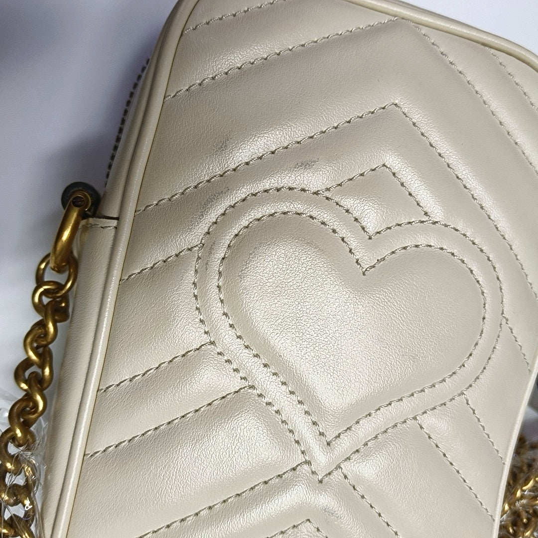 Authenticated pre-owned  GG Marmont Mini Calfskin White - Crossbody Bag at Looply