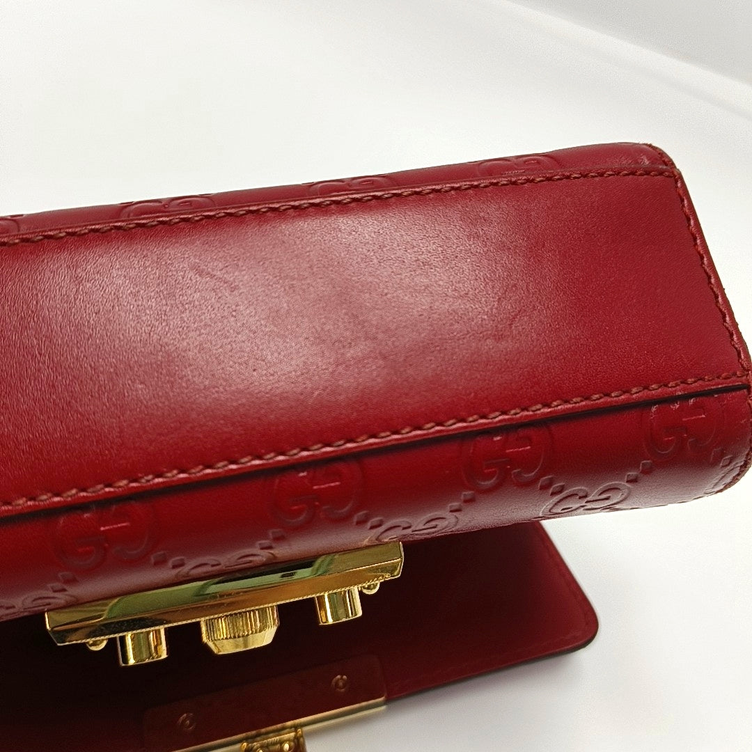 Authenticated pre-owned  Padlock Small Monogram Calfskin Red - Shoulder Bag at Looply