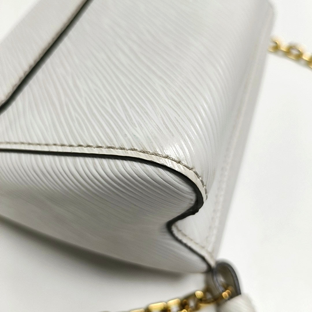 Authenticated pre-owned  Twist PM Epi White - Shoulder Bag at Looply