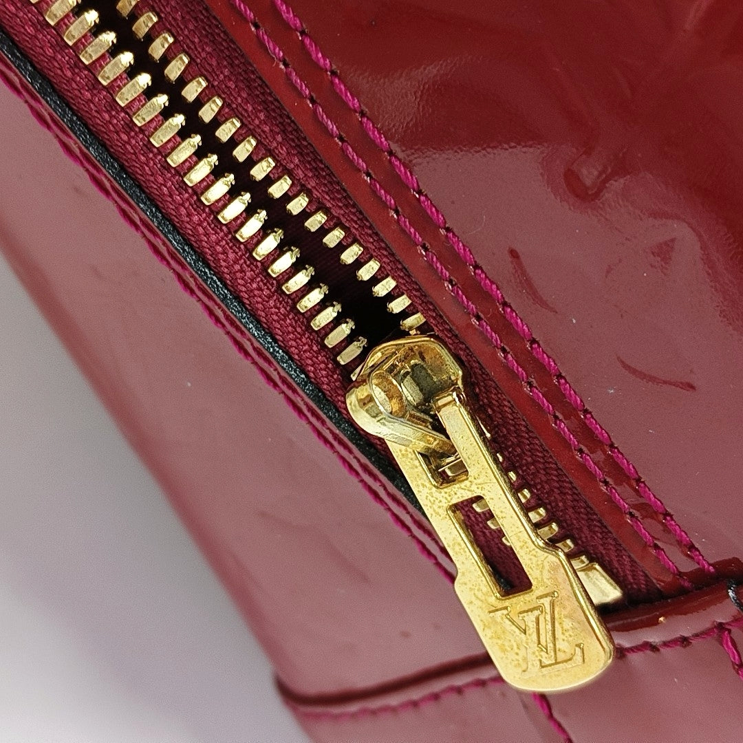 Authenticated pre-owned  Alma PM Monogram Calfskin Red - Top Handle Bag at Looply
