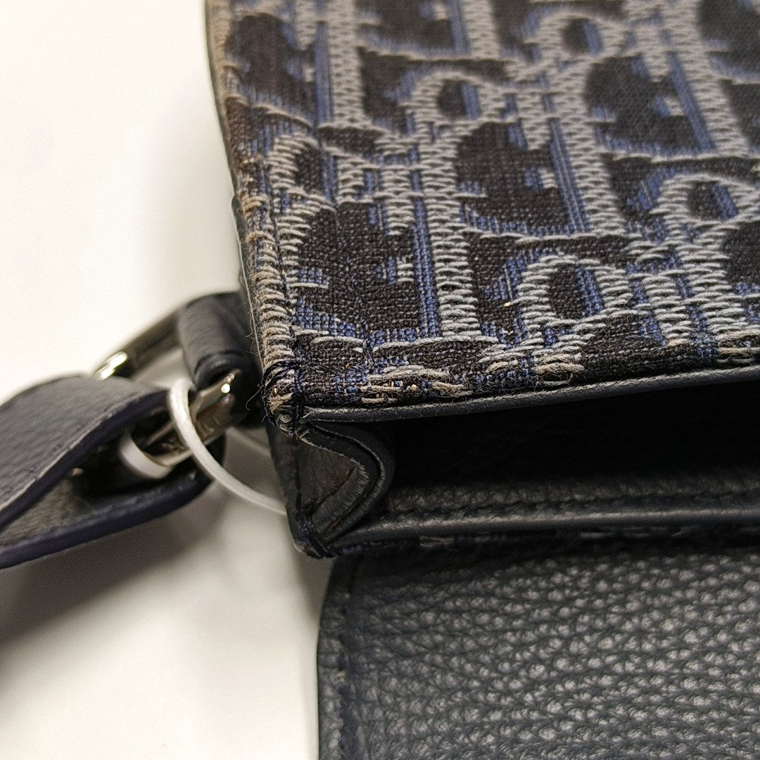Authenticated pre-owned  Saddle Oblique Canvas Blue - Shoulder Bag at Looply