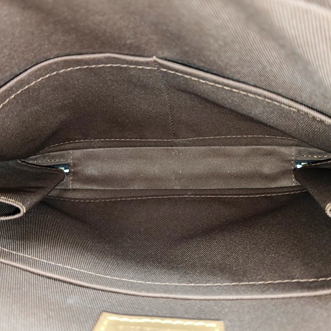 SOFT TRUNK PM Monogram Coated Canvas Brown