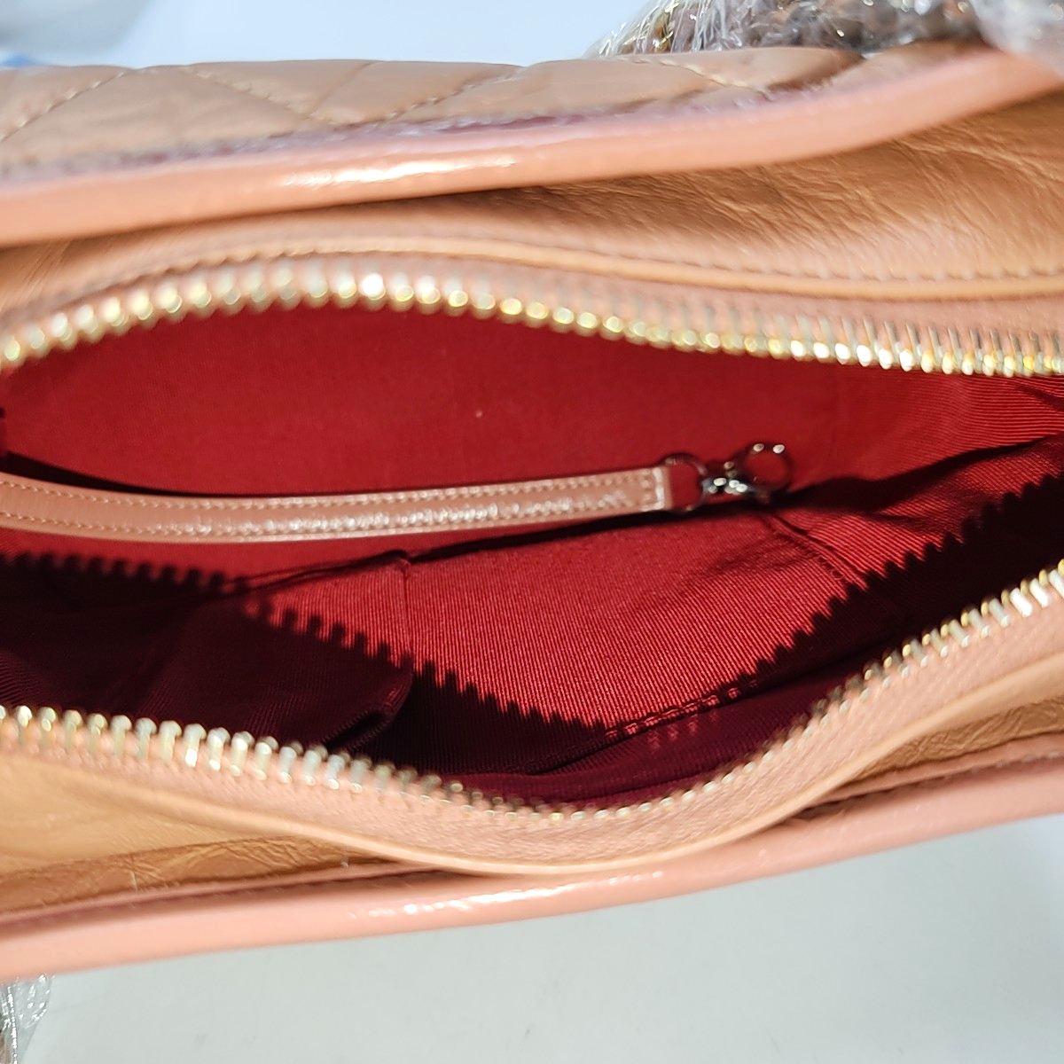 Authenticated pre-owned  Gabrielle Small Quilted Calfskin Beige - Crossbody Bag at Looply