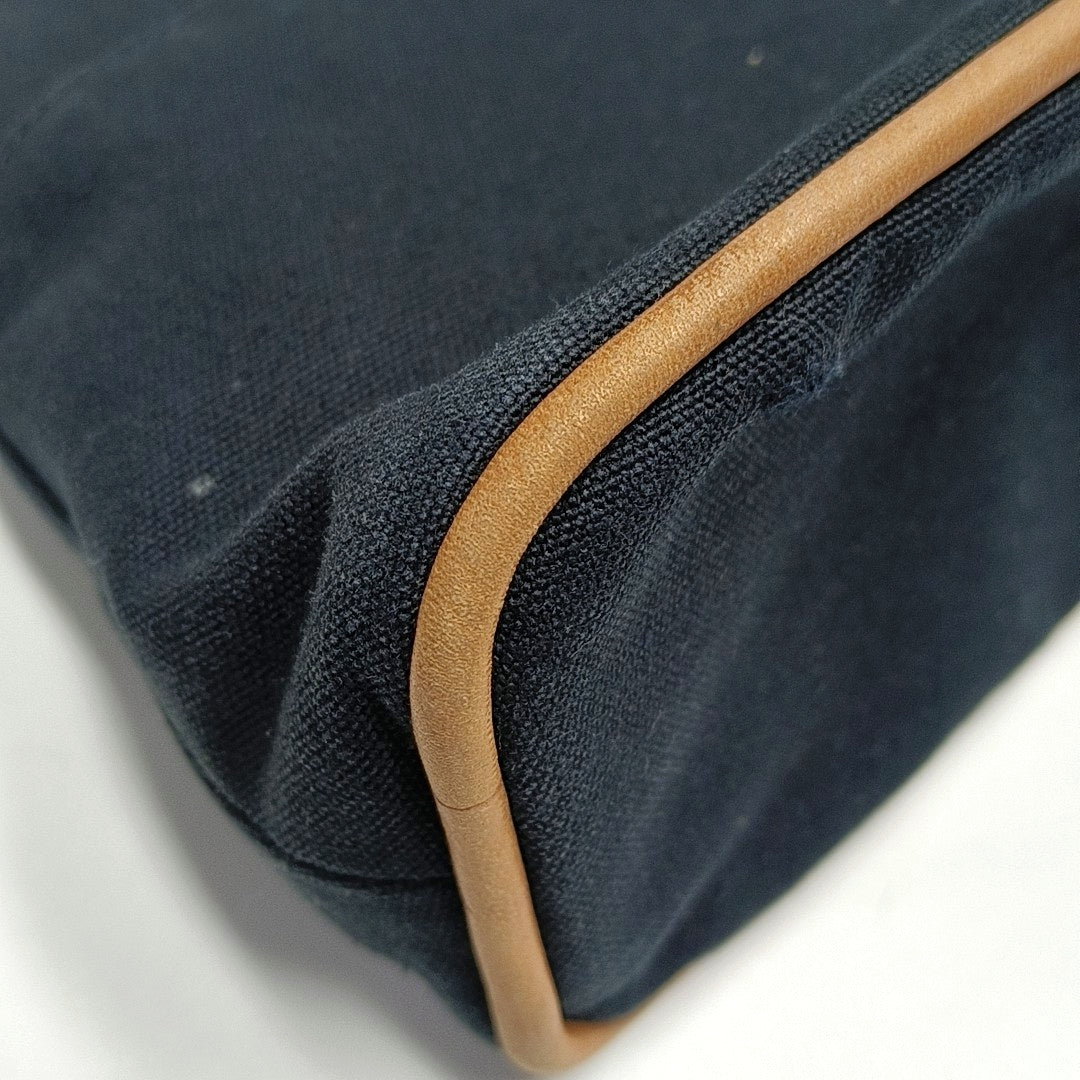 Authenticated pre-owned  Bolide Canvas Black - Clutch at Looply