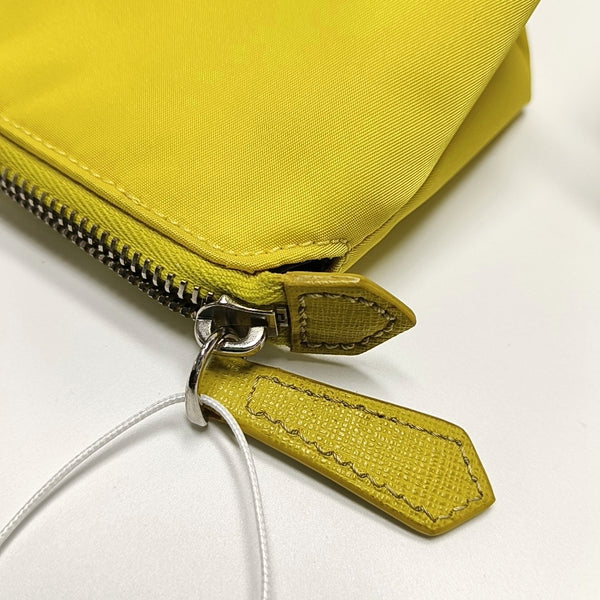 Authenticated pre-owned  Monster Nylon Yellow - Clutch at Looply