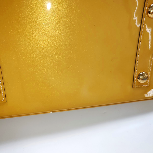 Authenticated pre-owned  Alma PM Patent Leather Yellow - Top Handle Bag at Looply