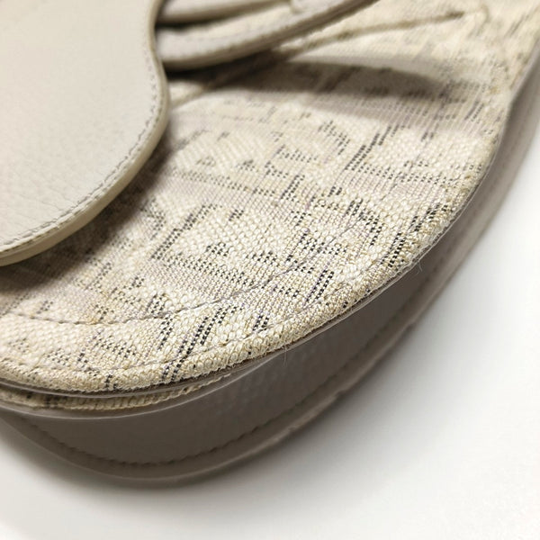 Authenticated pre-owned  Saddle Oblique Canvas Beige - Crossbody Bag at Looply