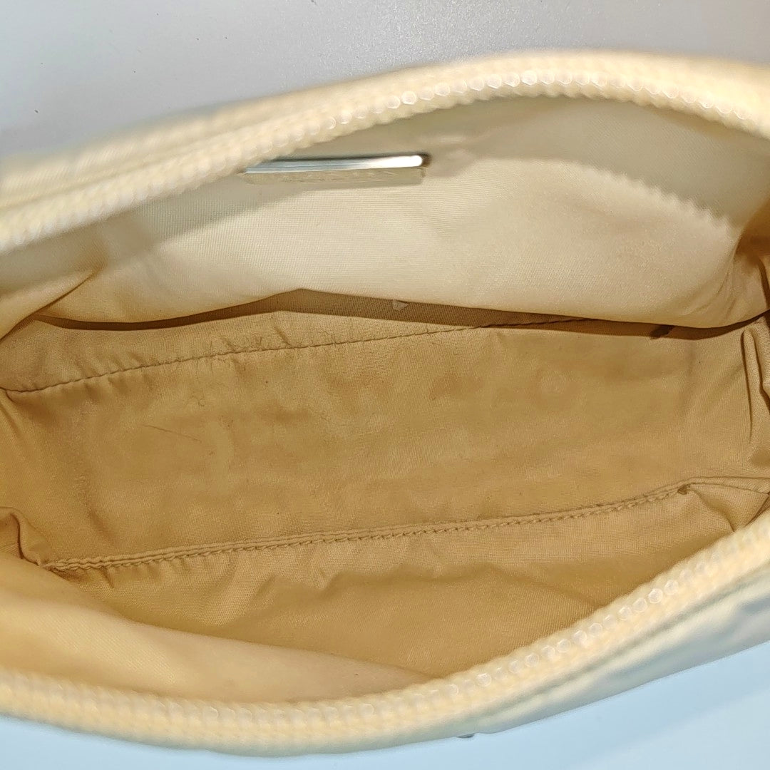 Authenticated pre-owned  Re-edition2000 Mini Nylon Beige - Top Handle Bag at Looply